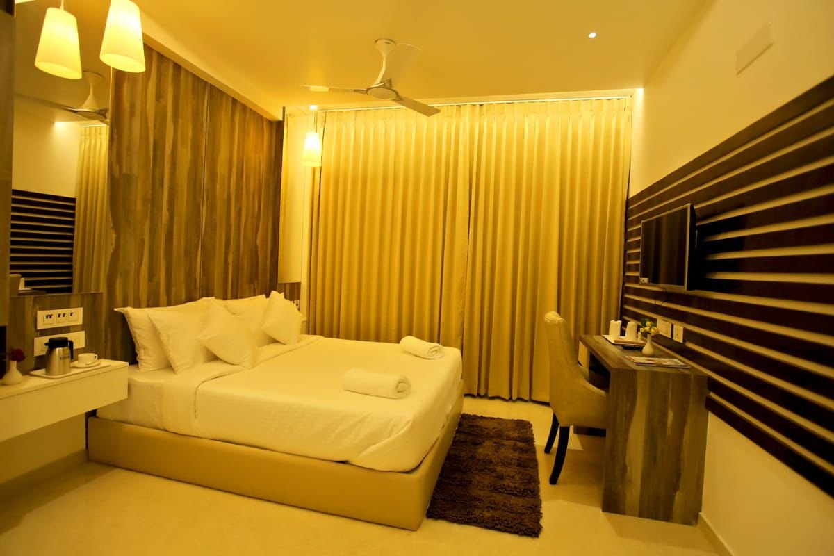 Warm beige curtains in an elegant bedroom